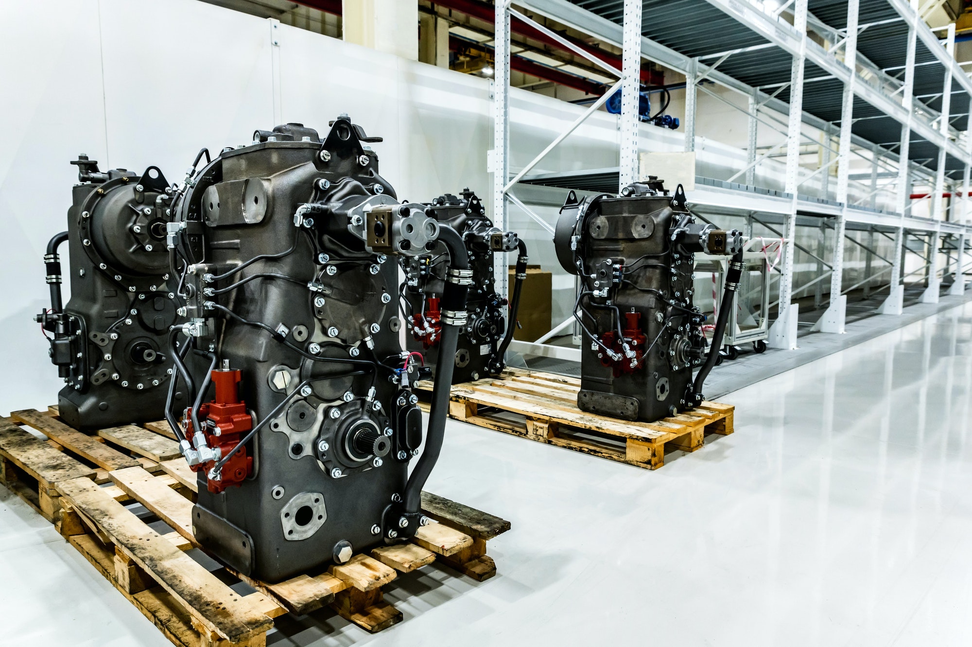 Disassembled tractor parts on the modern tractor factory